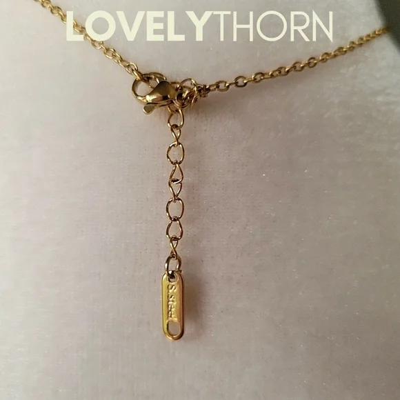 LOVELYTHORN // custom foxy lady 18K gold-plated 16 stainless steel nameplate